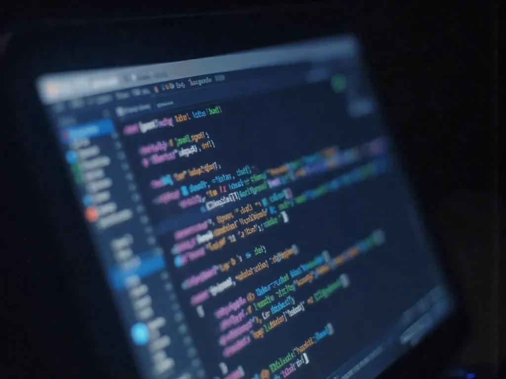 A dark code editor — the AI-readable foundation, in code